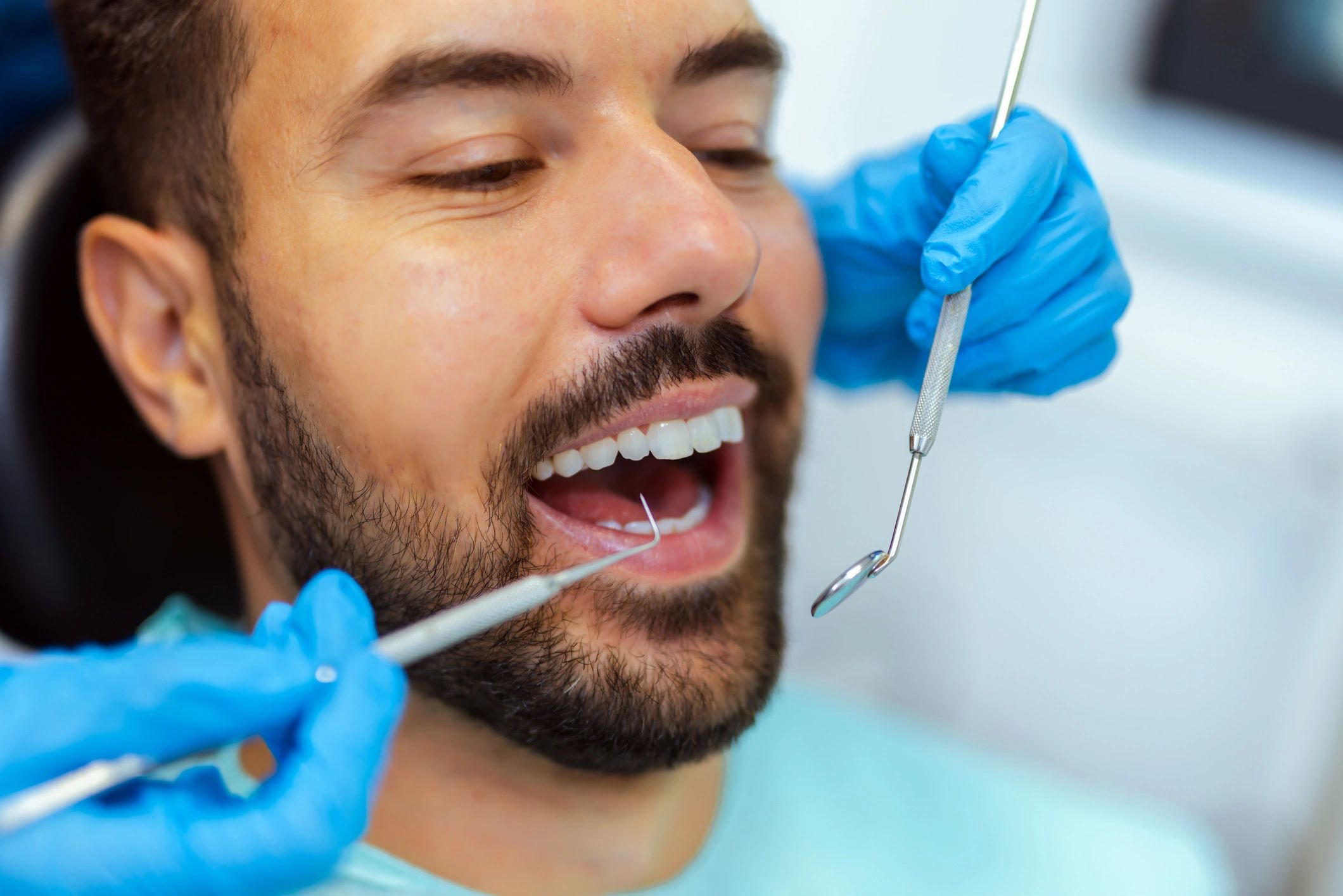 Close up dental exam for oral cancer screening