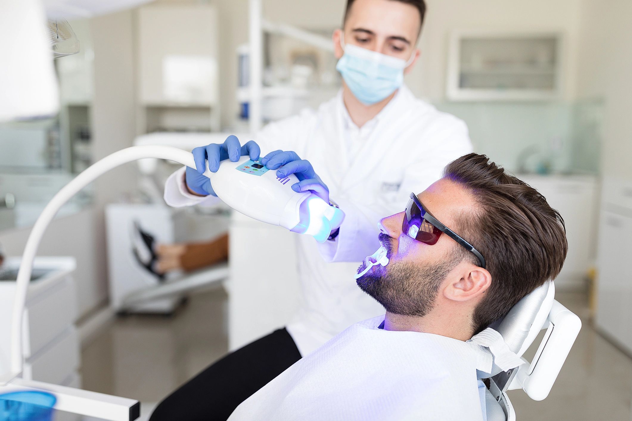 Dental treatment being performed in a modern clinic